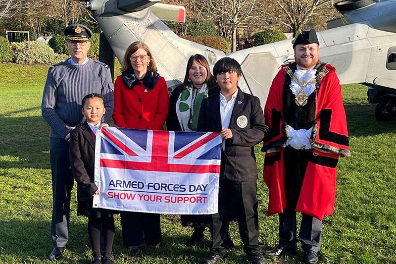The Mayor And Other Invited Guests In Front Of The Helicopter