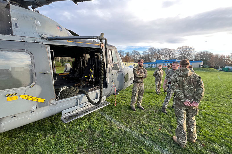 Close Up Of The Wildcat Helicopter With Miltary Personel