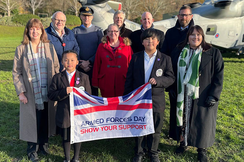 Officers, Councillors And Cabinet Members With The Armed Forces Day Flag And Children