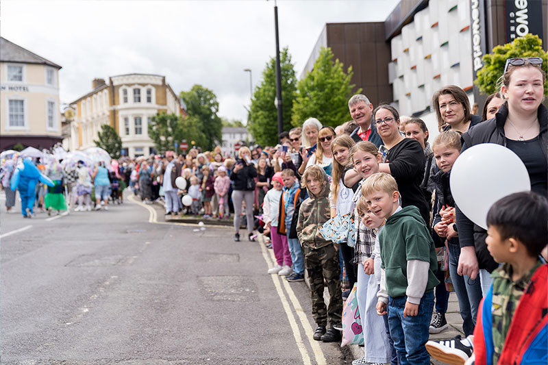 Crowds Lining The Streets Of Victoria Day